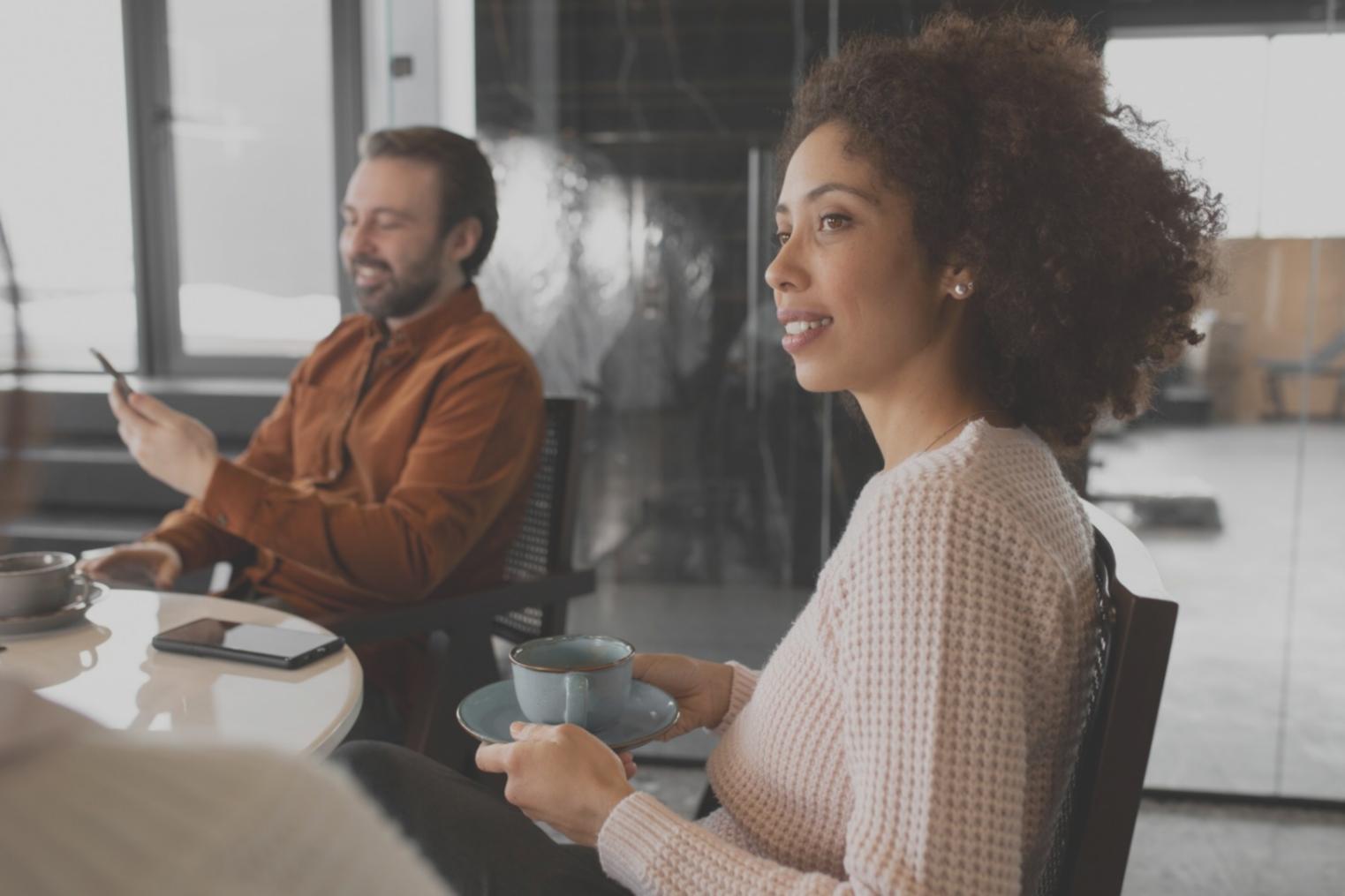 Diverse group of students discussing mental health case studies in classroom setting